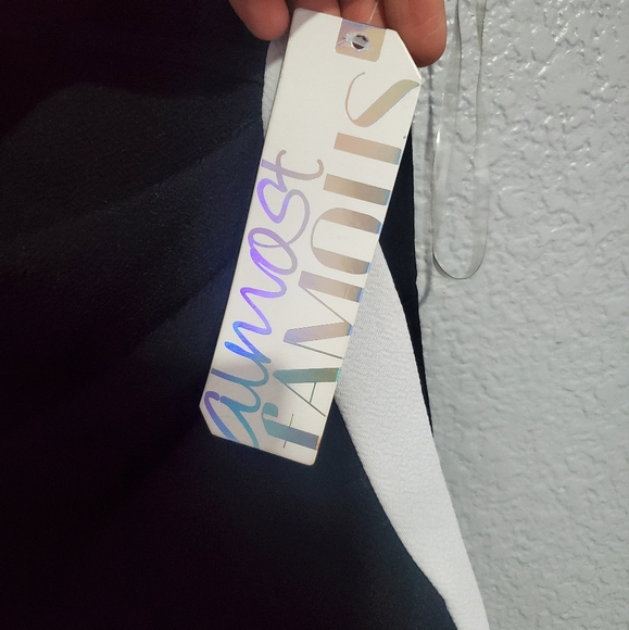 Almost Famous Bodycon Mini Romper Sleeveless Black/White Trim Assymmetric Hem L - Picture 10 of 11